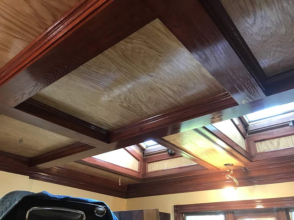 Coffered wood ceiling after staining and finish work
